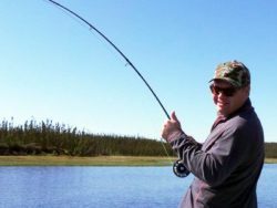 Angler with a fish on